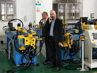 Client from Israel who need DW50CNC-3A-1S visiting our factory